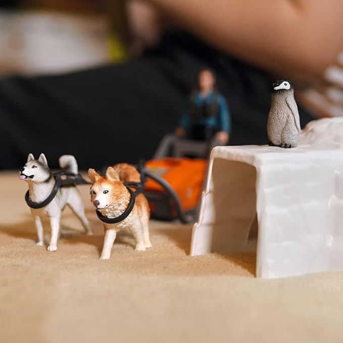 schleich Wild Life - 19 PC Antarctic Expedition Playset with Ranger, Husky Dogs, and Penguin Animal Figurines - Snow Safari Play Set with Dogsled and Igloo - Educational Toys for Kids 3 - 8 | 42558