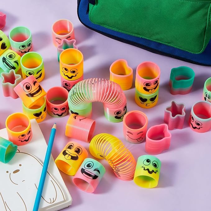 JOYIN 120 Pcs Spring Rainbow Party Favor, Mini Plastic Coil Spring Toy, Fidget Stress Coil Mini Springs Bulk Toys for Carnival Prize Birthday, Easter Goodie Bag Stuffers