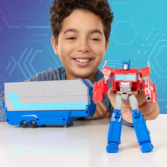 Transformers EarthSpark Optimus Prime Battle Trailer Playset with Action Figure, Lights and Sounds, Electronic Truck Toys for Kids 6 and Up