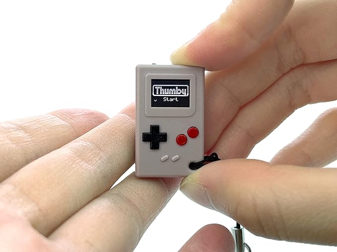 TinyCircuits Thumby Programmable Game Console Keychain – Retro Gaming Fun Mini-Console, STEM Learning, USB Rechargeable, 5 Preloaded Games (Gray)