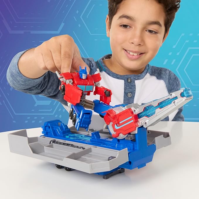 Transformers EarthSpark Optimus Prime Battle Trailer Playset with Action Figure, Lights and Sounds, Electronic Truck Toys for Kids 6 and Up
