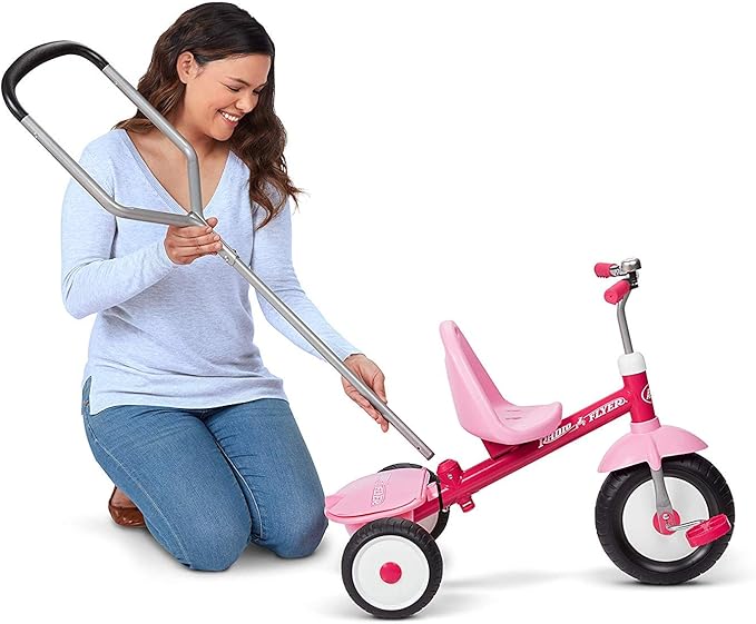 Radio Flyer Deluxe Steer & Stroll Trike, Pink, for Kids 2-5, 2-in-1 Parent Steer Tricycle Removable Push Handle Adjustable Seat Steel Frame Covered Storage Bin Tricycle for Toddlers and Kids.