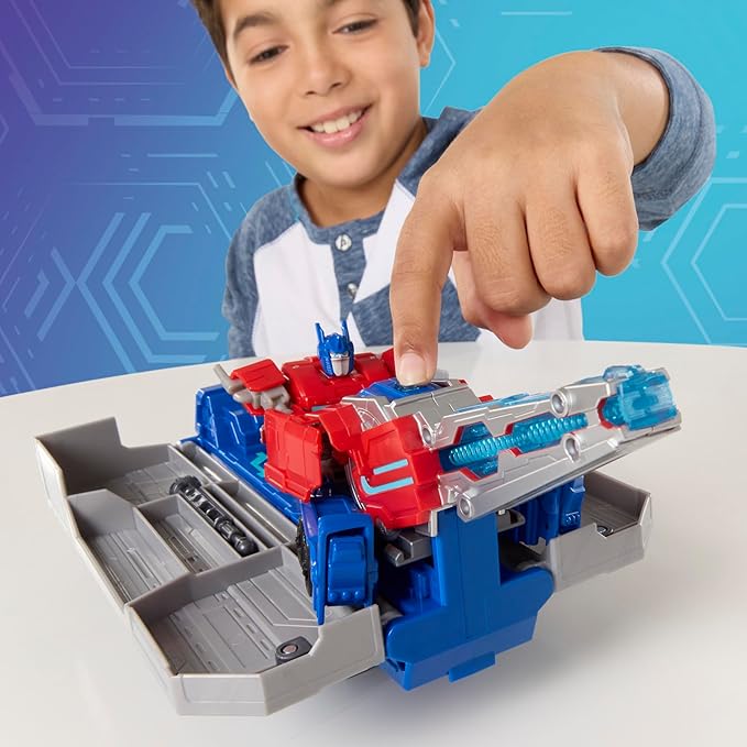 Transformers EarthSpark Optimus Prime Battle Trailer Playset with Action Figure, Lights and Sounds, Electronic Truck Toys for Kids 6 and Up