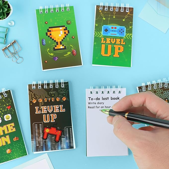 LiYiQ 122 Pcs Video Game Party Favors With Video Game Sunglasses Slap Bracelets Notebook Stamps Stickers and Gift Bag for Video Game Gamer Birthday Party Supplies