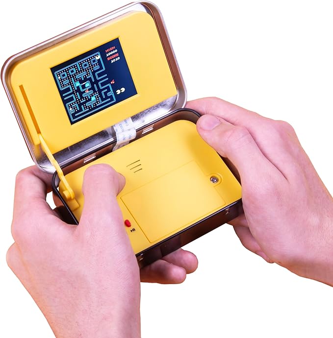 PAC-Man Arcade Game in a Tin. Full Colour 8-bit Game with Original Sounds & Graphics. Classic PAC-Man Gameplay. Includes 2.4” Screen. Officially Licensed PAC-Man Merchandise.