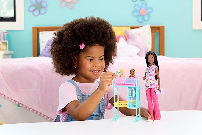 Barbie Careers Baby Doctor Playset with Brunette Doll Wearing Scrubs, 2 Baby Dolls, Examination Table & Accessories