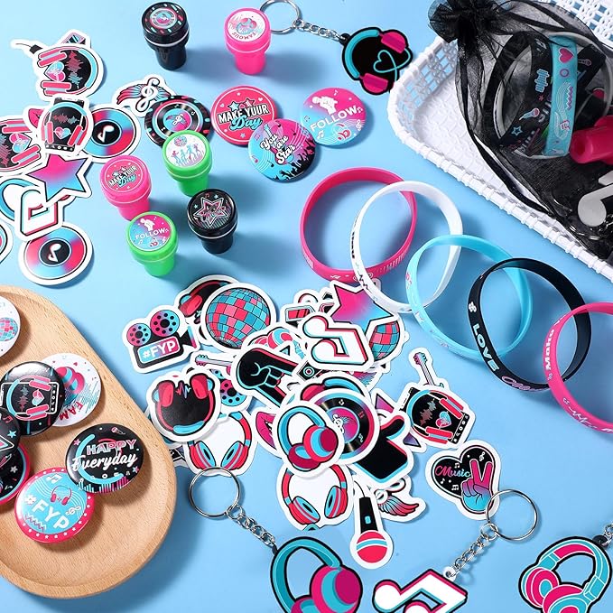 Capoda 110 Pcs Music Party Favor Supplies Kit Media Theme Gift Bag Filler Silicone Bracelets Button Pins Music Keychains Stampers Stickers for Boys Girls Birthday Party Decorations Supplies