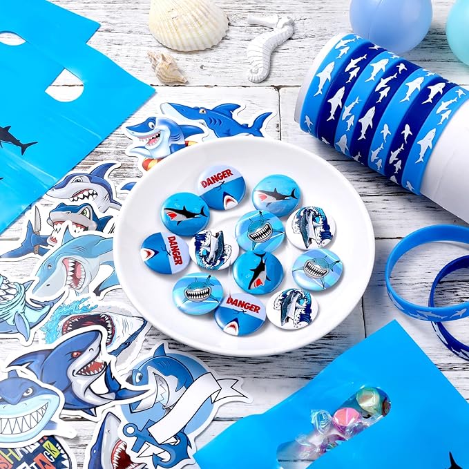 Jerify 110 Pcs Shark Party Favors Keychains Tooth Necklaces, Silicone Bracelet Wristbands Button Pins Gift Bags and Stickers for Birthday Shark Party Supplies Ocean Sea