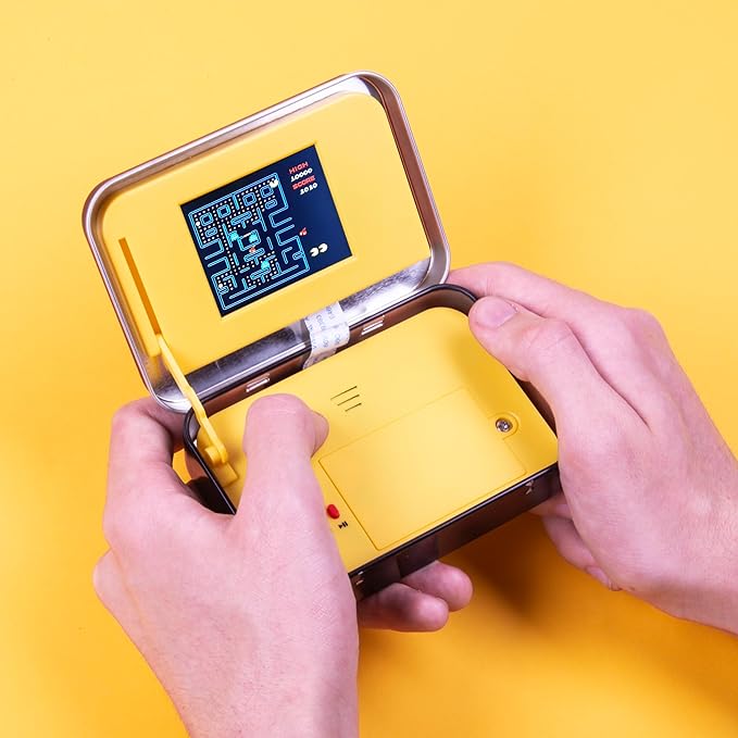 PAC-Man Arcade Game in a Tin. Full Colour 8-bit Game with Original Sounds & Graphics. Classic PAC-Man Gameplay. Includes 2.4” Screen. Officially Licensed PAC-Man Merchandise.
