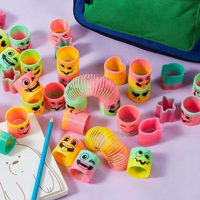 JOYIN 60 Pcs Spring Rainbow Party Favor, Mini Plastic Coil Spring Toy, Fidget Stress Coil Mini Springs Bulk Toys for Carnival Prize Birthday, Easter Goodie Bag Stuffers